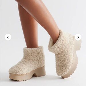 Fashion Nova Cream Fleece Platform Boots